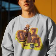 serious-male-model-sweatshirt-mockup-standing-against-yellow-wall-in-hard-sunset-lighting-0290